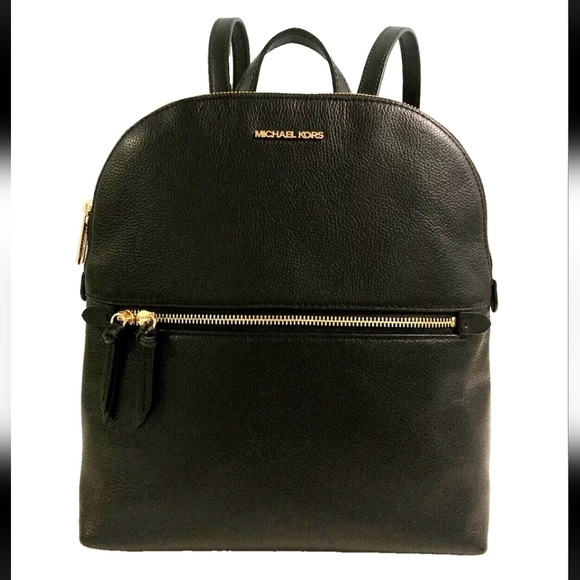 Michael Kors Handbags - Michael Kors Dallas slim backpack purse NWT